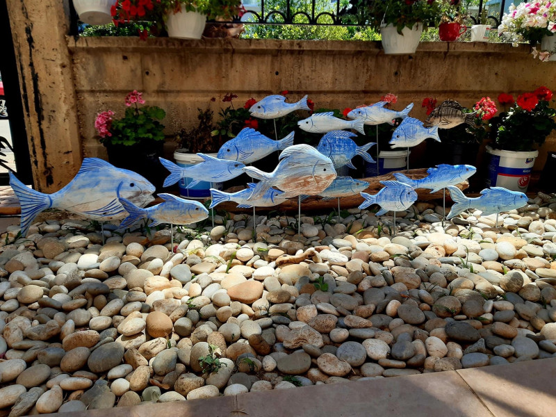Blue fish on stand